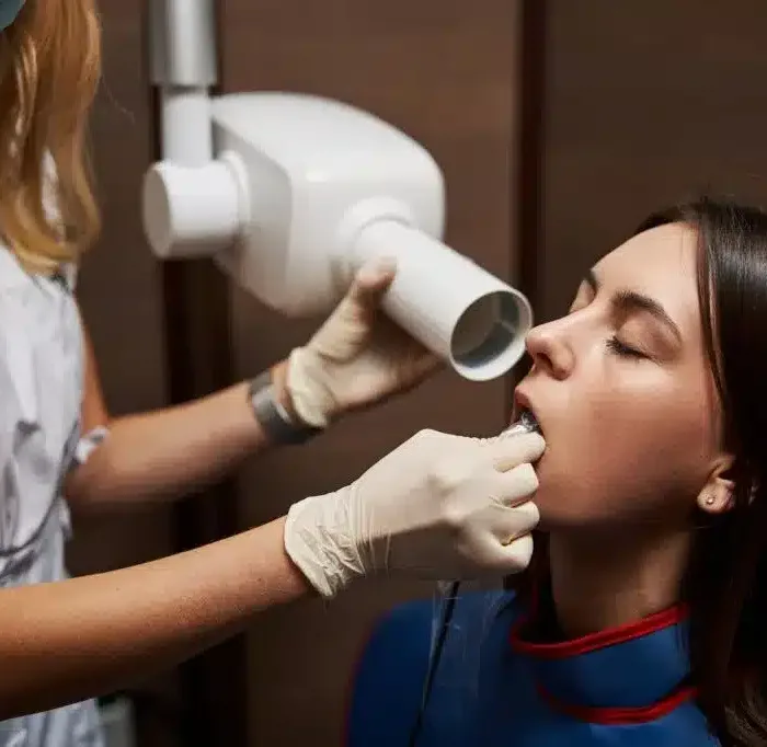 relaxed-female-is-undergoing-dental-x-ray-examination-1024x682